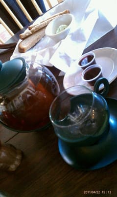 Photo of The Village House Kalina - La Mesa, CA, US. Imported Ukrainian Tea $9.99/pot, comes with cherry syrup and currant syrup to mix in.