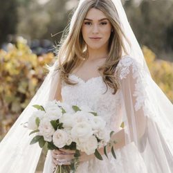 Winnie Couture - Beautiful lace capes Winnie dress with custom butterfly appliqués. For more info https://www.winniecouture.com/product/3502-santorini/