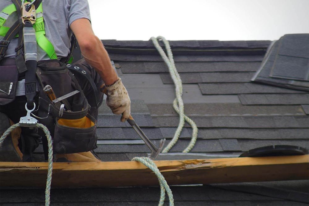 Slide of T2K Roofing