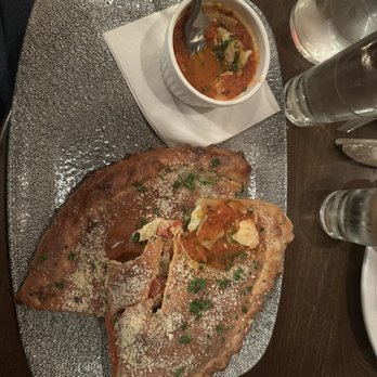 Devil's Advocate - Calzone, a little heavy on the parm for me, but great tastes - Bars Near Me - Minneapolis, Minnesota
