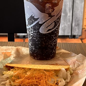 Taco Bell - a hot dog and a drink on a table - Fast Food Near Me - Santa Clara, California