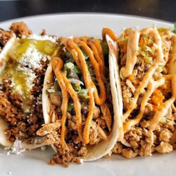 301 Tacos and Pizza - 3 Tacos w/sides. Beef, Blackened Chicken, Old Bay w/black beans and street corn.