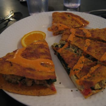 Crazy Burger - JUST IN QUESADILLA - Steamed spinach, tomato, goat cheese, artichoke hearts & scrambled eggs in a tomato tortila, w/ red pepper - Juice Bars & Smoothies Near Me - Narragansett, Rhode Island