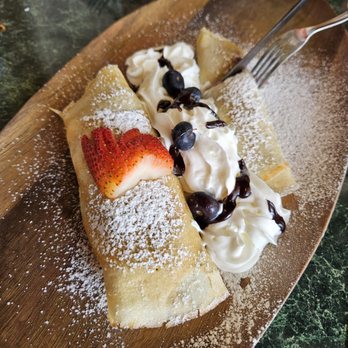 Bayside Cafe - Strawberry and chocolate moose crepes on the left and lemon blueberry ricotta on the right YUM! - Breakfast & Brunch Near Me - Panama City Beach, Florida Bayside Cafe - Strawberry and chocolate moose crepes on the left and lemon blueberry ricotta on the right YUM! - Breakfast & Brunch Near Me - Panama City Beach, Florida