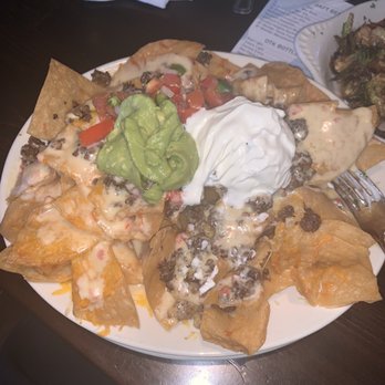 On The Kirb - 1/2 order delicious nachos...huge order! - Sports Bars Near Me - Houston, Texas