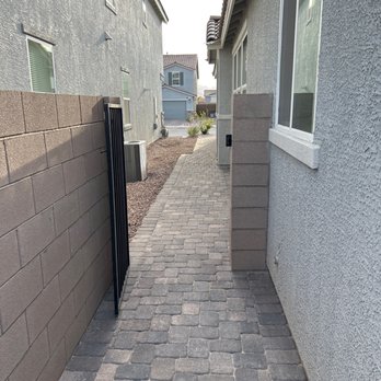 EG Landscape - a walkway between two houses - Landscaping Near Me