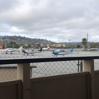 Sky Kitchen - a view of an airport with planes parked on the tarmac - Breakfast & Brunch Near Me - San Carlos, California