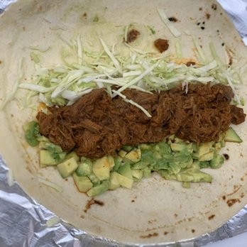 Flor’s Kitchen - Estofado burrito served with mayo, cabbage and avocado. - Food Trucks Near Me - Midland, Texas Flor’s Kitchen - Estofado burrito served with mayo, cabbage and avocado. - Food Trucks Near Me - Midland, Texas
