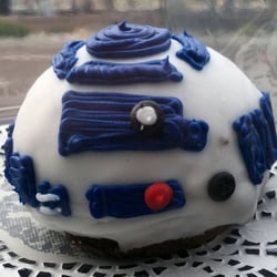 Elegant Desserts - Close-up of R2D2 chocolate cake donut for "National Star Wars Day."