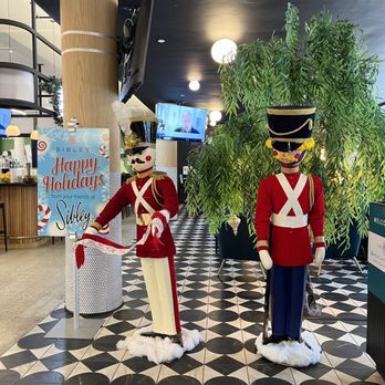 Mercantile On Main - Holiday decorations with vintage Sibleys Santa's workshop animatronics - Food Court Near Me - Rochester, New York