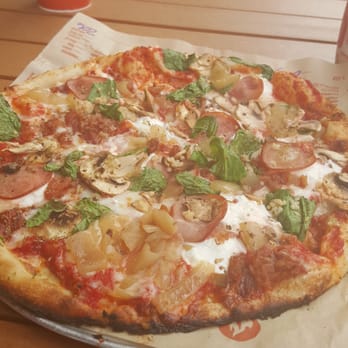 Blaze Pizza - Spicy marinara, mozerella, goat cheese, ricotta, spinach mushrooms, sautéed onions, bacon, ham, oregano, and minced garlic.LOVE! - Pizza Near Me - Mason, Ohio Blaze Pizza - Spicy marinara, mozerella, goat cheese, ricotta, spinach mushrooms, sautéed onions, bacon, ham, oregano, and minced garlic.LOVE! - Pizza Near Me - Mason, Ohio