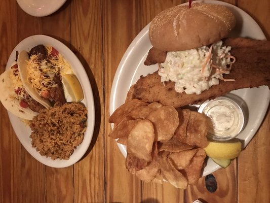 Photo of Phish Tales - Lake City, FL, US. Everything on the pates will blow your mind: fish tacos and fish sandwich.