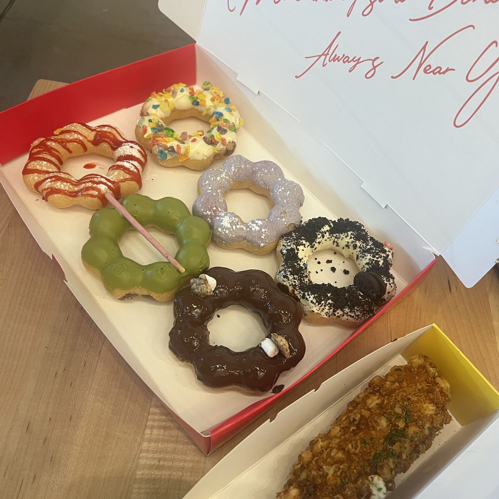 Mochinut - raspberry funnel cake, fruity pebbles, strawberry matcha, ube, dark chocolate teddy bear and cookies & creme - Donuts Near Me - Reno, Nevada