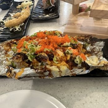 Kakuna Sushi - Baked scallop or baked Lion King Roll - Sushi Bars Near Me - San Leandro, California Kakuna Sushi - Baked scallop or baked Lion King Roll - Sushi Bars Near Me - San Leandro, California