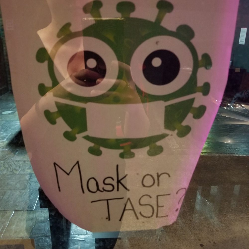 Nikki's Irish Pub - a mask with a face drawn on it - Pubs Near Me - Houston, Texas Nikki's Irish Pub - a mask with a face drawn on it - Pubs Near Me - Houston, Texas