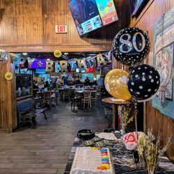 Taco Mac - Inside the private event space for our friend Al's 80th birthday party. This Taco Mac in Marietta has been his spot for 25+ years.