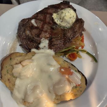 Tommy's Restaurant - Steak and twice baked potato with crab and shrimp - New American Near Me - Visalia, California Tommy's Restaurant - Steak and twice baked potato with crab and shrimp - New American Near Me - Visalia, California
