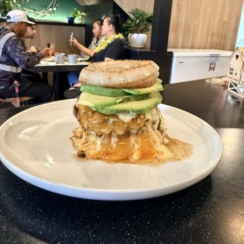 Rise Cafe - Onion-wrapped bacon double cheeseburger with avocado. Serving local wagyu beef patties. - Coffee & Tea Near Me - Honolulu, Hawaii Rise Cafe - Onion-wrapped bacon double cheeseburger with avocado. Serving local wagyu beef patties. - Coffee & Tea Near Me - Honolulu, Hawaii