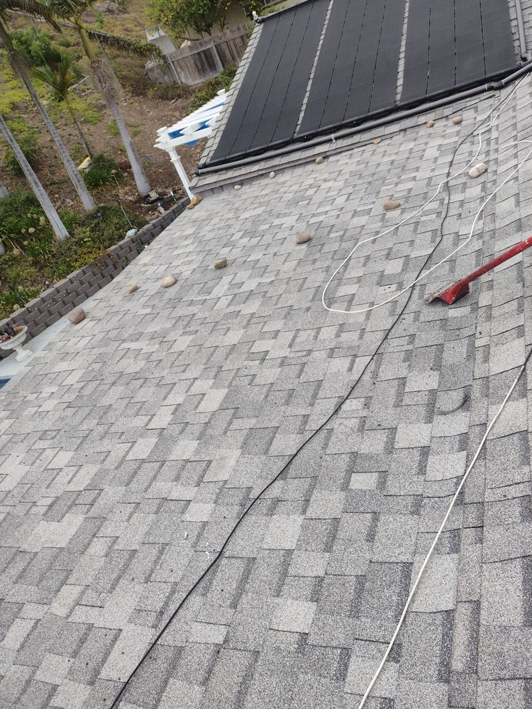 Slide of Mendez roofing