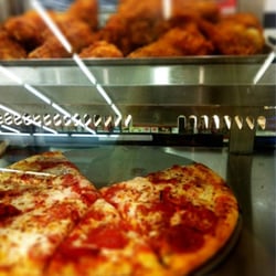 7-Eleven - $1 slice of pizza