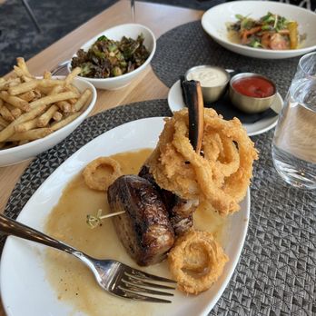 Commission Row - Pork chops, fries, crispy brussels sprouts, & scallops - Steakhouses Near Me - Indianapolis, Indiana