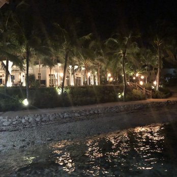 Latitudes - Sunset Key Cottages - Outside the restaurant at night. - Seafood Near Me - Key West, Florida