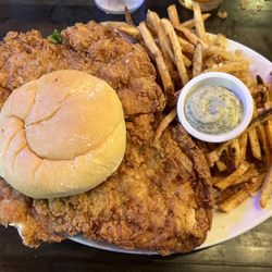 R-Bar & Grill - Fried chicken thigh sandwich and garlic fries.