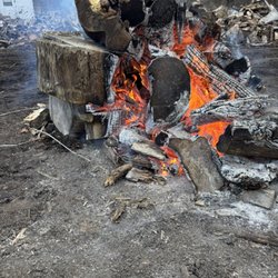 Walker's Lawn & Landscaping - Burning rounds of season wood