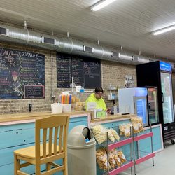 Old Fashion Ice Cream - More of the ice cream bar with flavors listed on the blackboard. Ice cream pints and pies in the refrigerator for takeaway looked good!