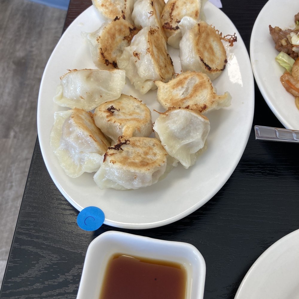 Jiayuan Dumpling House - Chicken and corn by the blue C and pork and Napa at the top served with sauce - Szechuan Near Me - Redondo Beach, California Jiayuan Dumpling House - Chicken and corn by the blue C and pork and Napa at the top served with sauce - Szechuan Near Me - Redondo Beach, California