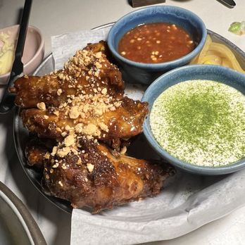 Kingfisher - CRISPY CHICKEN WINGS Lorem ipsum Tamarind Glaze, Crispy Garlic, Peanuts, House Pickles, Toasted Coconut Ranch, Hot Sauce 8/10 - Vietnamese Near Me - San Diego, California