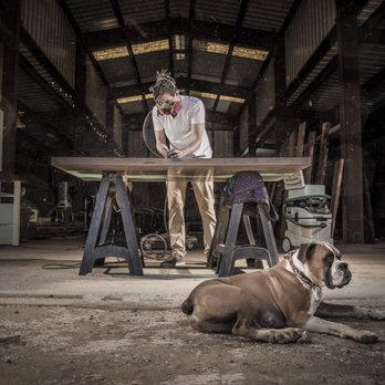Kristopher Kirkpatrick - Kristopher Kirkpatrick and Admiral Butters working on a custom ordered piece of wood and resin furniture. - Carpenters Near Me Kristopher Kirkpatrick - Kristopher Kirkpatrick and Admiral Butters working on a custom ordered piece of wood and resin furniture. - Carpenters Near Me