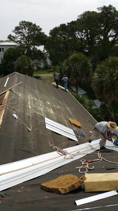 Slide of Port City Roofing