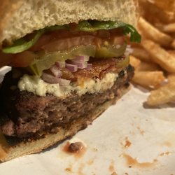 Post Office Saloon & Grill - Blue cheese burger. Note they use a blue cheese spread. It is not stuffed with blue cheese.