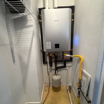 Water Heater Doctor - Rinnai RXP199in tankless water heater installed in interrior of home with roof termination kit - Plumbing Near Me - Centennial, Colorado Water Heater Doctor - Rinnai RXP199in tankless water heater installed in interrior of home with roof termination kit - Plumbing Near Me - Centennial, Colorado