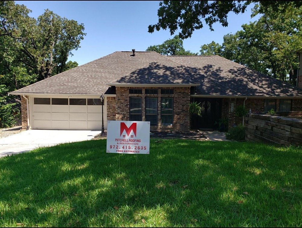 Slide of Mitchell Roofing & Restoration