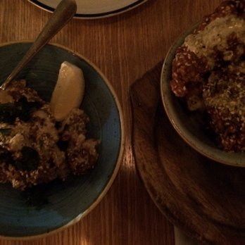 Byblos - Middle Eastern fried chicken with a spicy red schug hot sauce and the seared cauliflower. - Mediterranean Near Me - Toronto, Ontario Byblos - Middle Eastern fried chicken with a spicy red schug hot sauce and the seared cauliflower. - Mediterranean Near Me - Toronto, Ontario