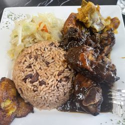 Caribbean Hut - Jerk Chicken was spicy good...but wasn't fresh....more bones than meat for a large.