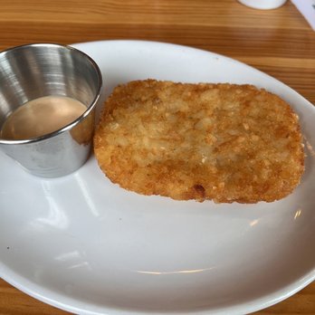 Bomb Biscuit - Hashbrown patty with dynamite sauce - Breakfast & Brunch Near Me - Atlanta, Georgia