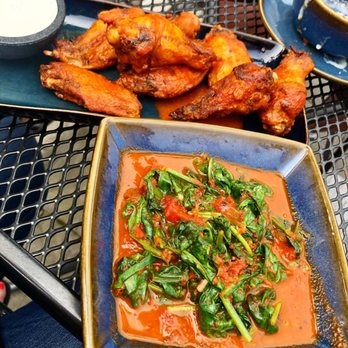 Anejo Mexican Bistro - Habanero wings and chipotle braised spinach! - Mexican Near Me - Hyannis, Massachusetts