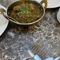 Khan Spices Indian Restaurant - Main dish with greens