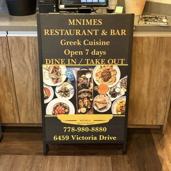 Mnimes Restaurant & Bar - Sign - Greek Near Me - Vancouver, British Columbia Mnimes Restaurant & Bar - Sign - Greek Near Me - Vancouver, British Columbia