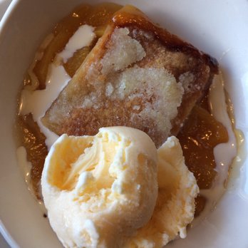 Cotton Patch Cafe - Peach cobbler with vanilla ice cream - American Near Me - Rockwall, Texas