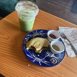 Iced matcha horchata and mushroom empanada Iced matcha horchata and mushroom empanada