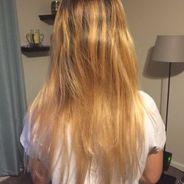 The picture doesn't do it justice, but it shows where she hacked a few chunks and layers of hair off.