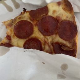 Pepperoni pizza slice Pepperoni pizza slice