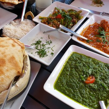 Rasika West End - Lamb biryani on the left and some naan - Indian Near Me - Washington, DC, District of Columbia Rasika West End - Lamb biryani on the left and some naan - Indian Near Me - Washington, DC, District of Columbia