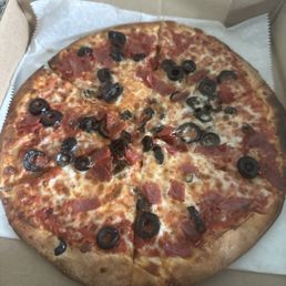 10" pie, thin crust with salami and black olives 10" pie, thin crust with salami and black olives