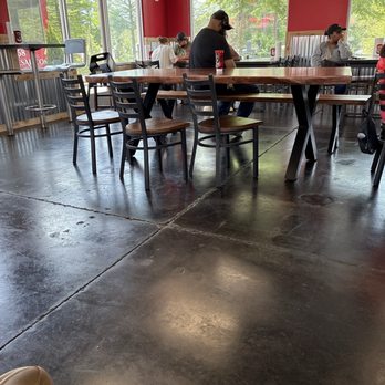 Smoke N Bones - Table with a deer on the wall. - Barbeque Near Me - Little Rock, Arkansas Smoke N Bones - Table with a deer on the wall. - Barbeque Near Me - Little Rock, Arkansas
