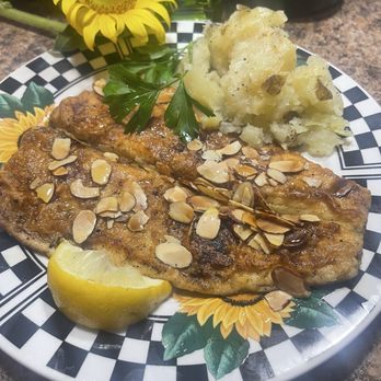 Blueberry Hill - Trout Almodein  with roasted almonds over wild brown rice. It was amazing - American Near Me - Saint Louis, Missouri